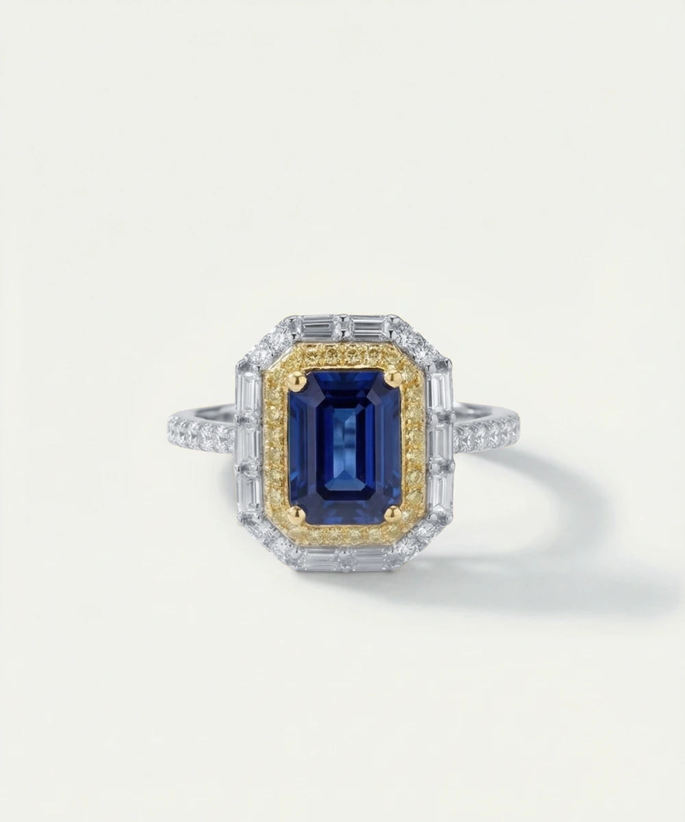 Ring with a blue gemstone and gold accents on a white background