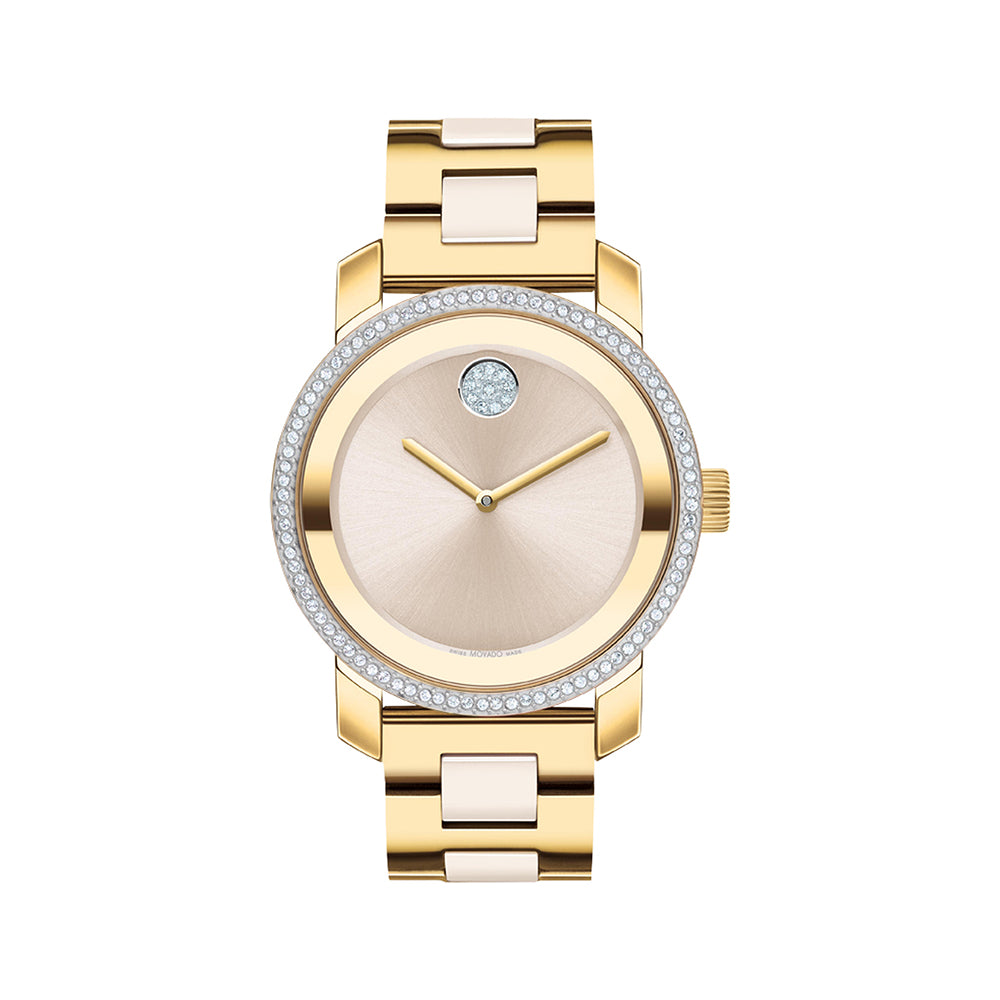 Gold watch with a beige face on a white background
