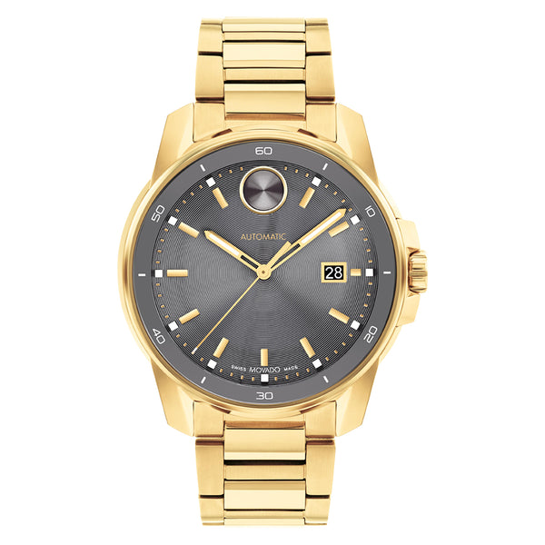 Gold wristwatch with a dark gray dial on a white background