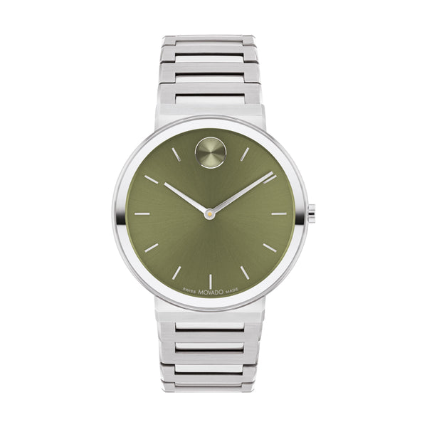 Silver watch with a green face on a white background