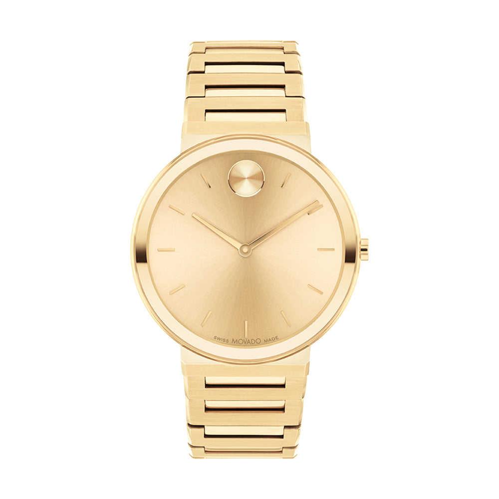 Gold wristwatch with a visible brand logo on a white background