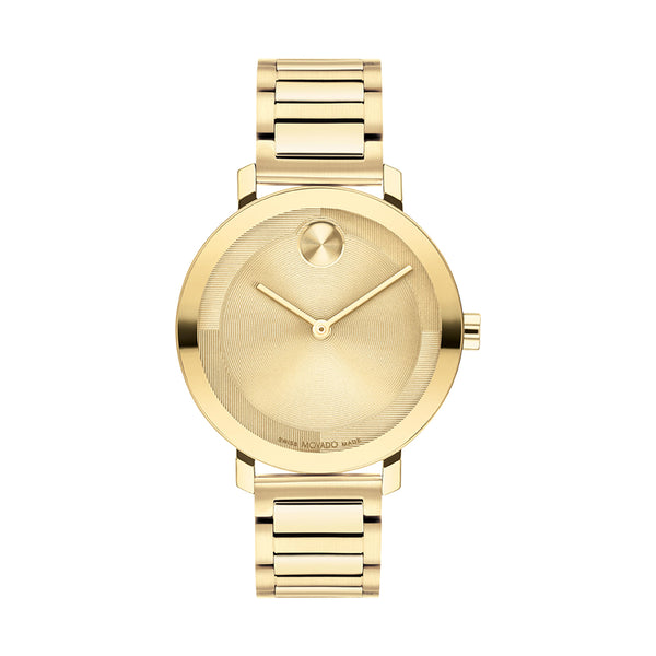 Gold wristwatch with a white background