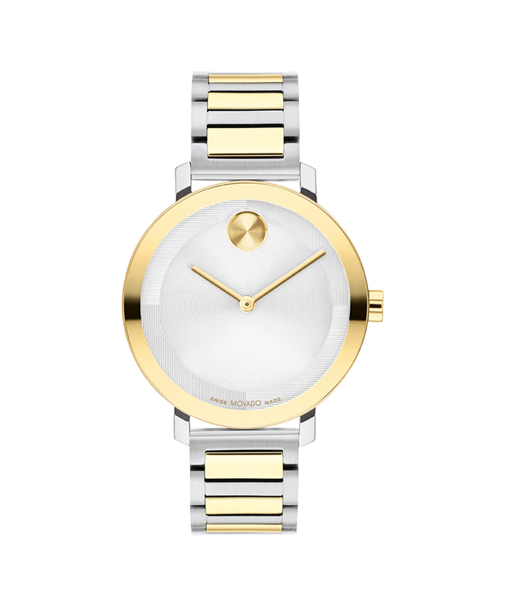 Two-tone watch with gold and silver band on a white background