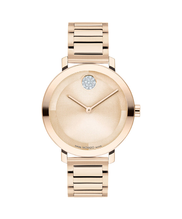 Rose gold watch with a diamond on the face against a white background