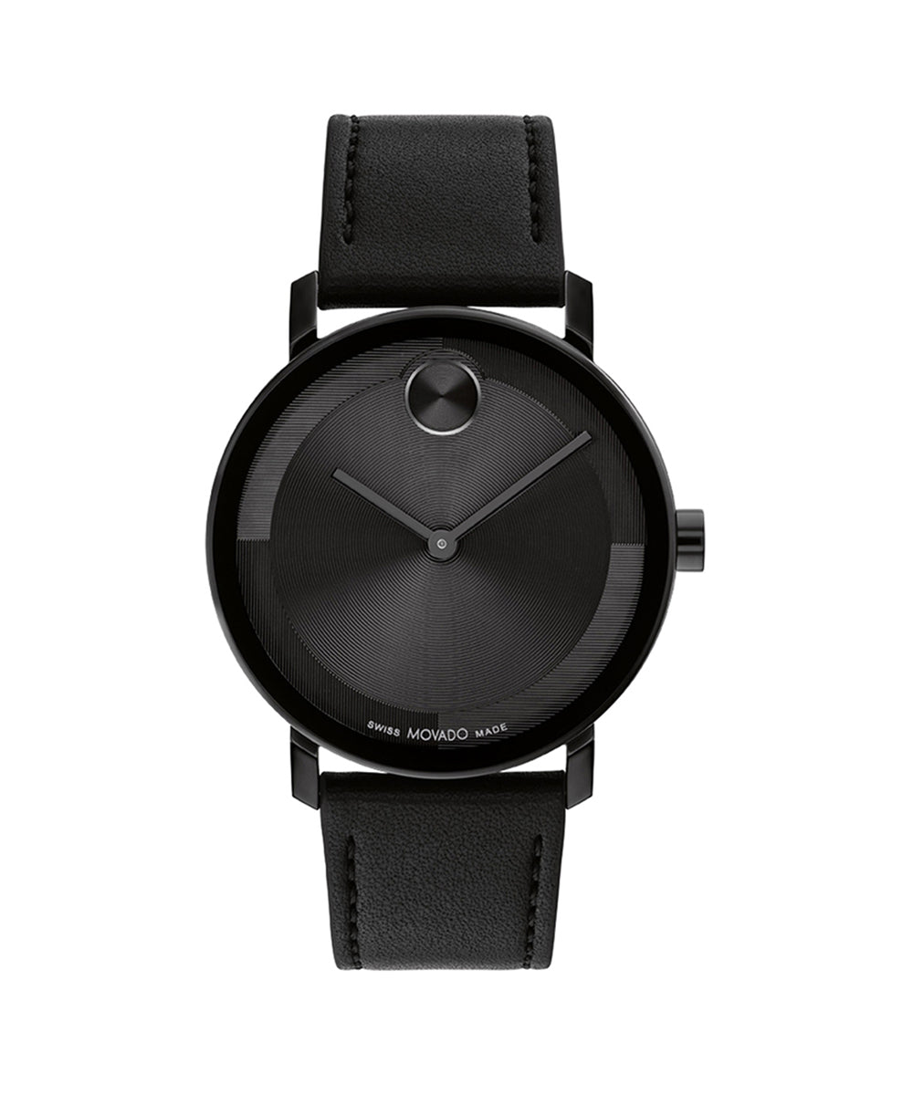 Black wristwatch with a black strap on a white background