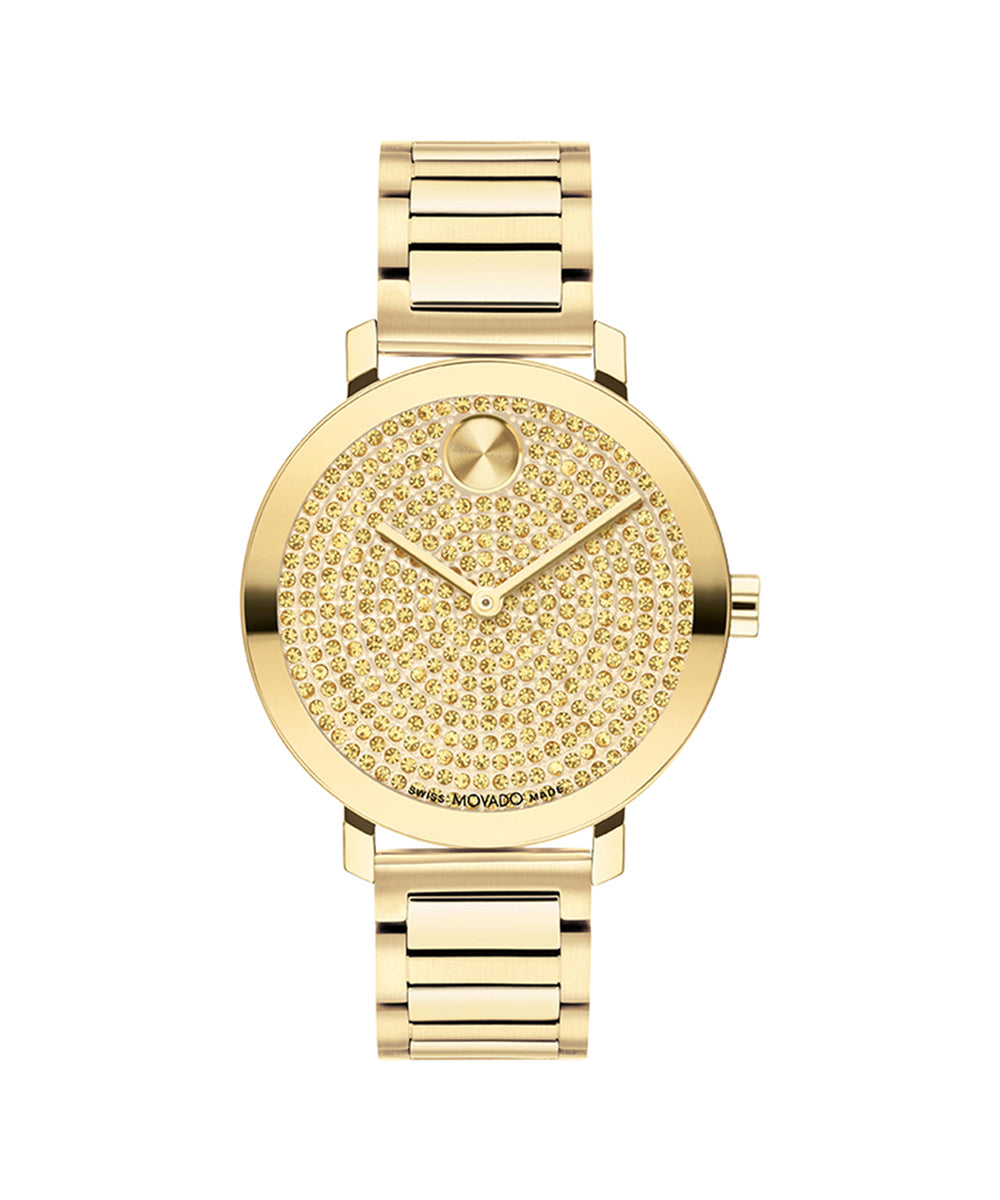 Gold watch with a detailed face on a white background