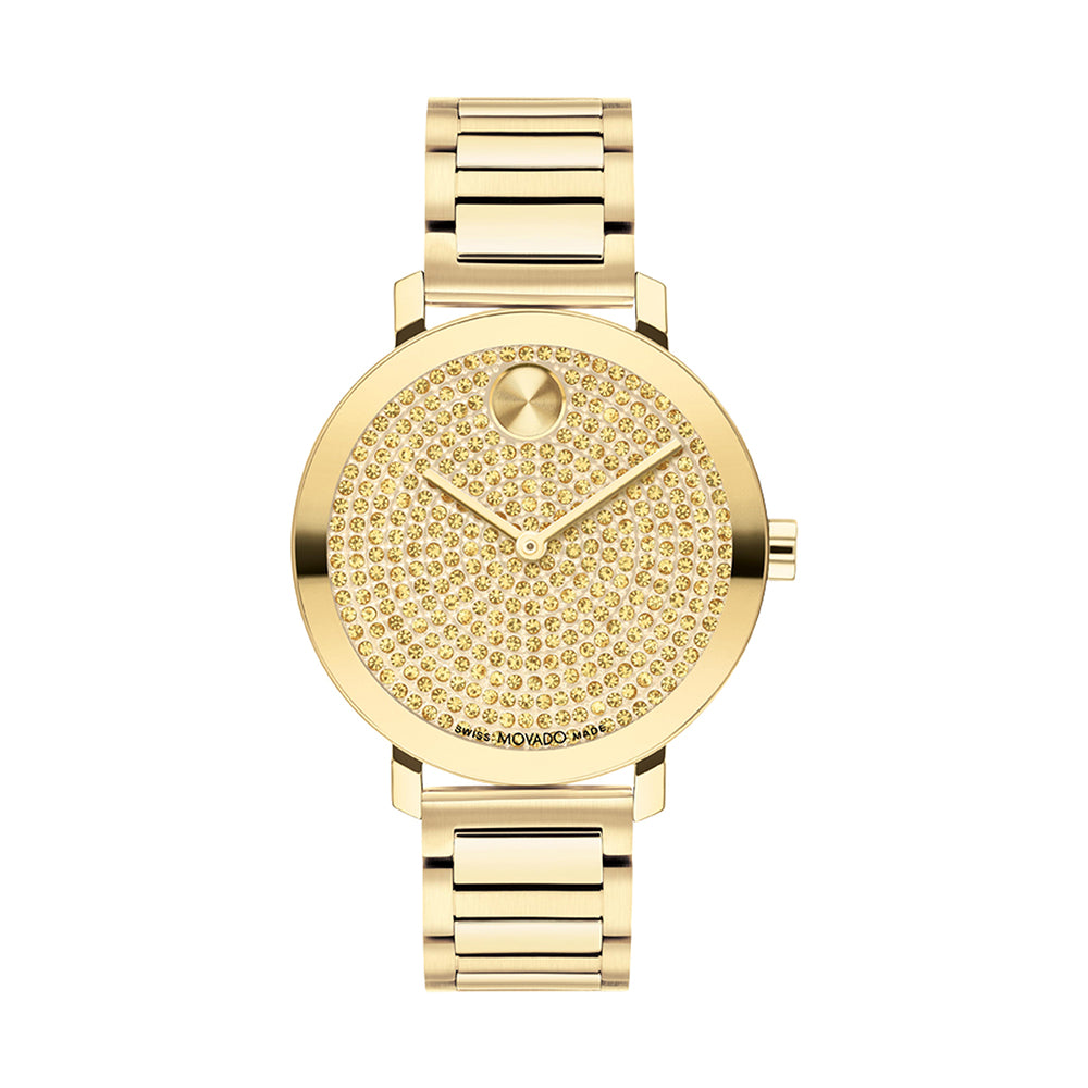 Gold wristwatch with a detailed face on a white background