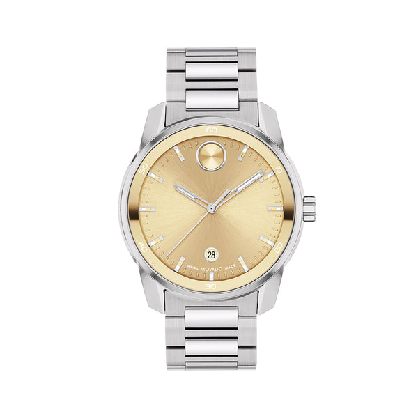 Watch with gold face and silver metal strap on white background