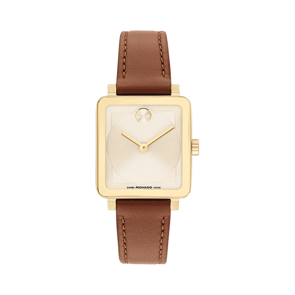 Gold watch with a brown leather strap on a white background