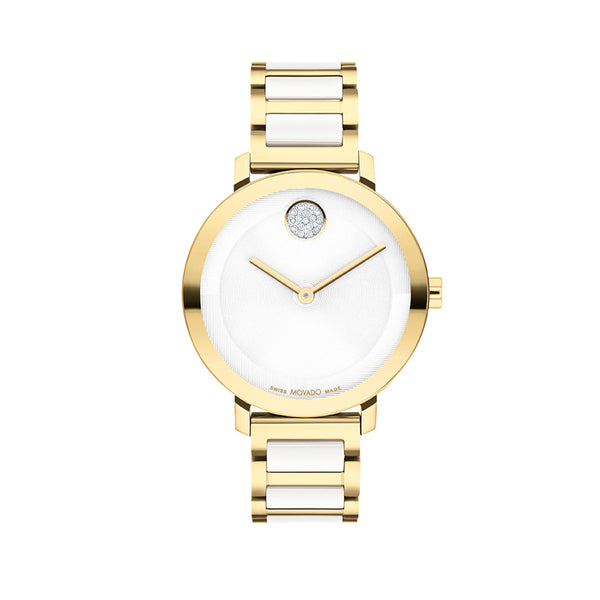 Gold watch with white face and band on a white background