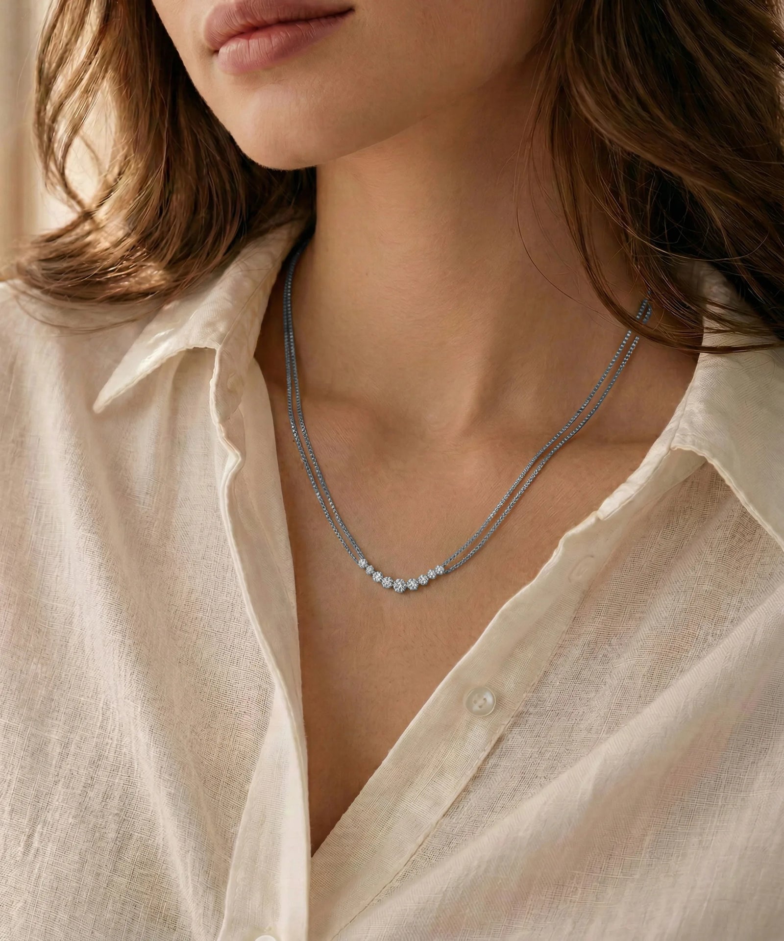 Necklace worn by a person with a neutral background