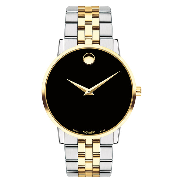 Two-tone watch with gold and silver band on a white background
