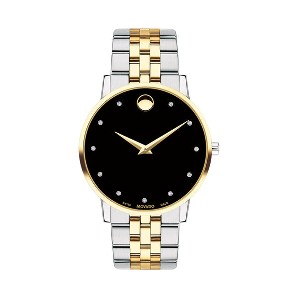 Two-tone watch with gold and silver band on a white background
