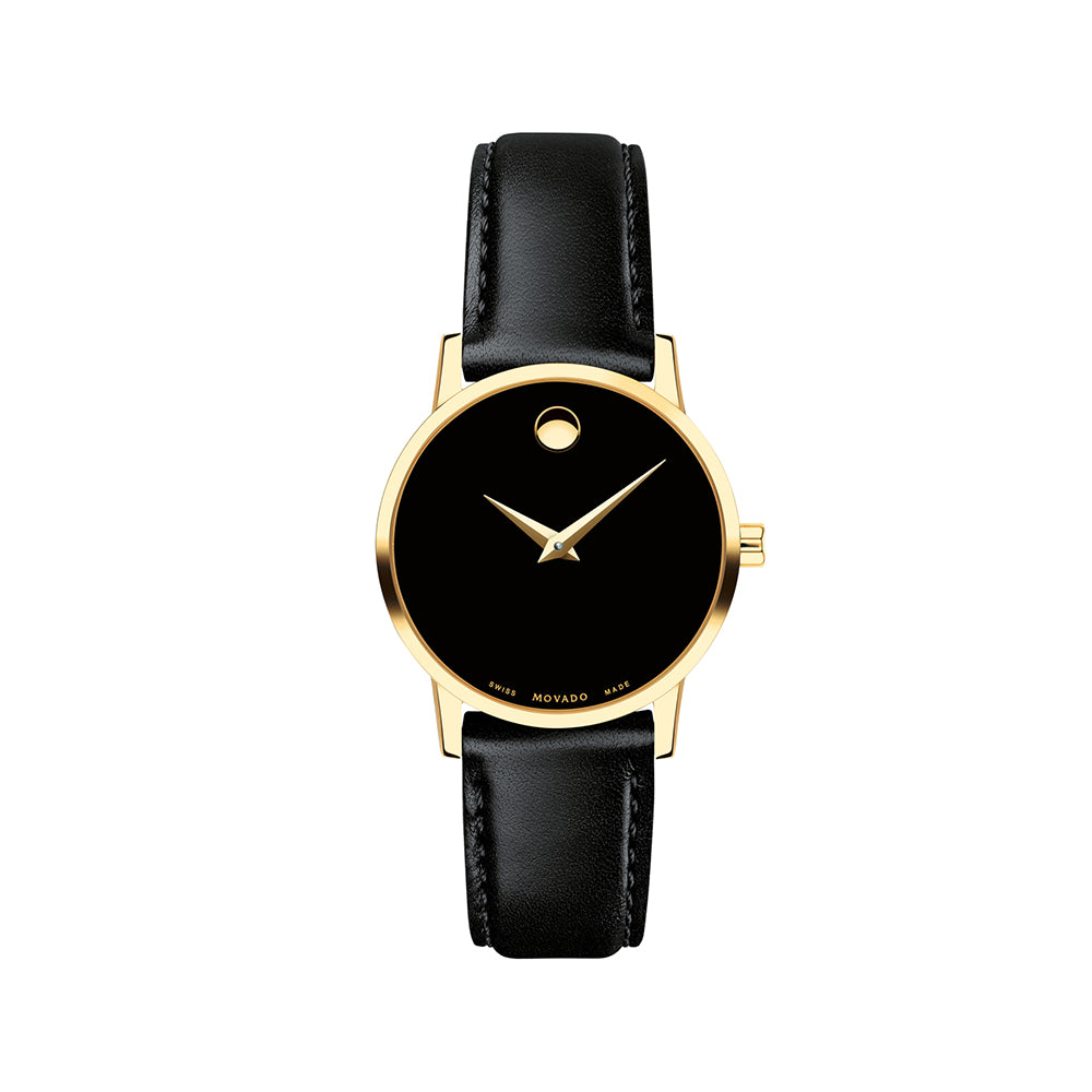 Black watch with gold case and black leather strap on a white background