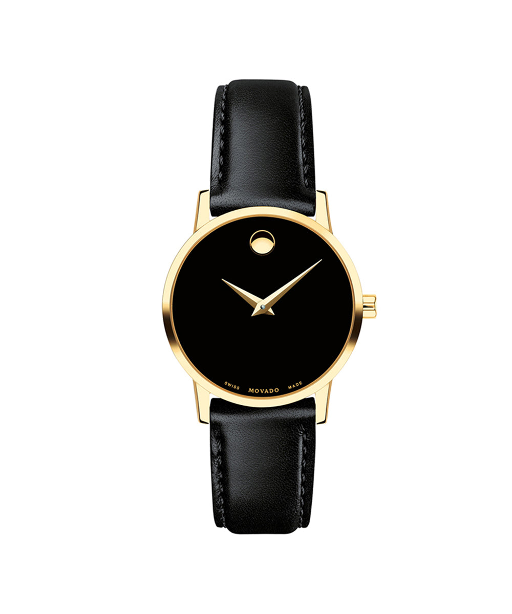 Black watch with gold case and black leather strap on a white background