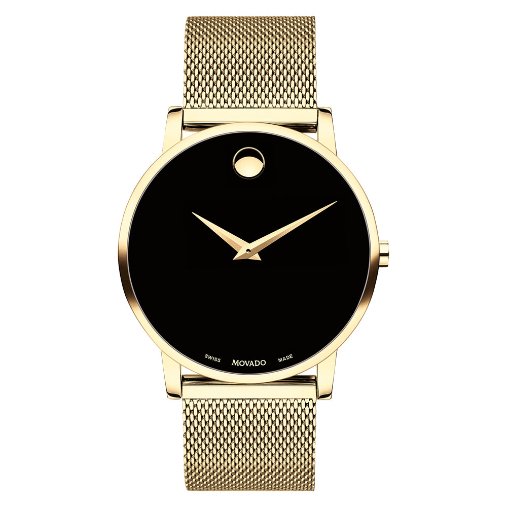 Gold watch with black face on a white background