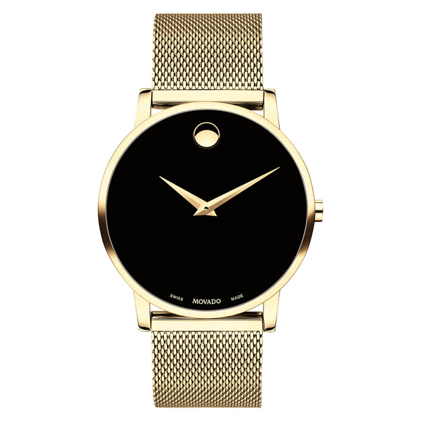 Gold watch with black face on a white background