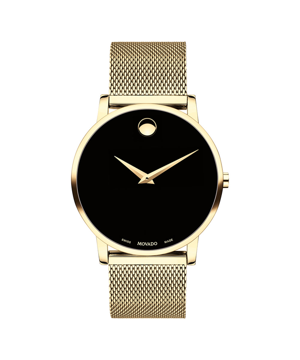 Gold watch with black face on a white background