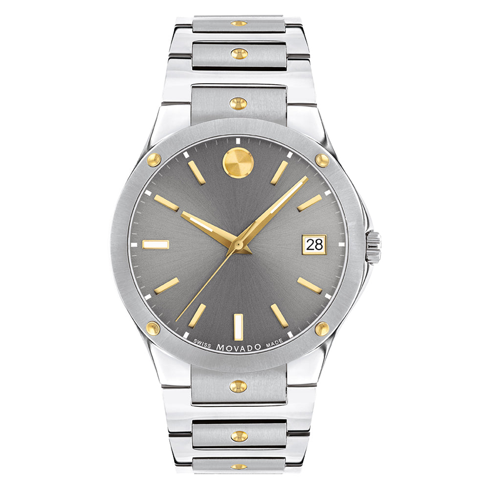 Silver and gold watch with gray dial on a white background