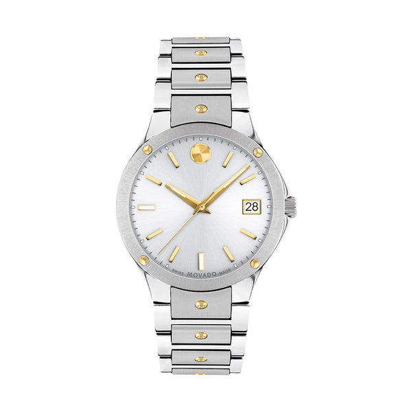 Silver watch with gold accents on a white background