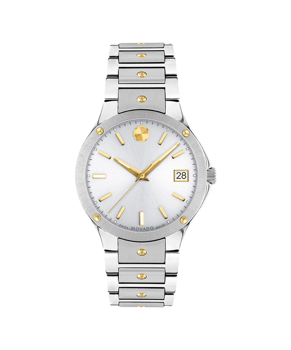 Silver and gold watch with a white face on a white background