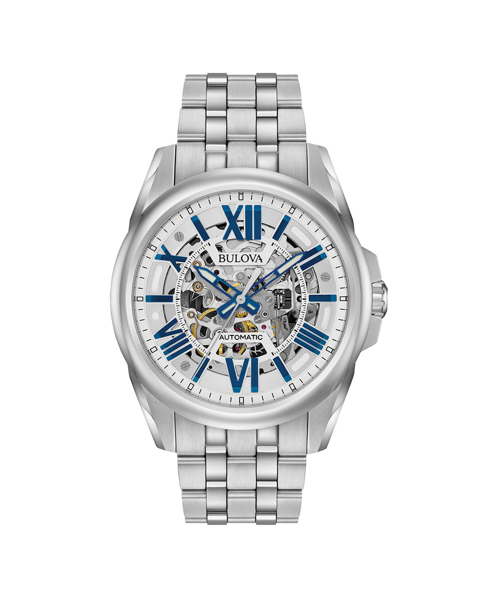 Silver Bulova watch with a white face and blue Roman numerals on a white background