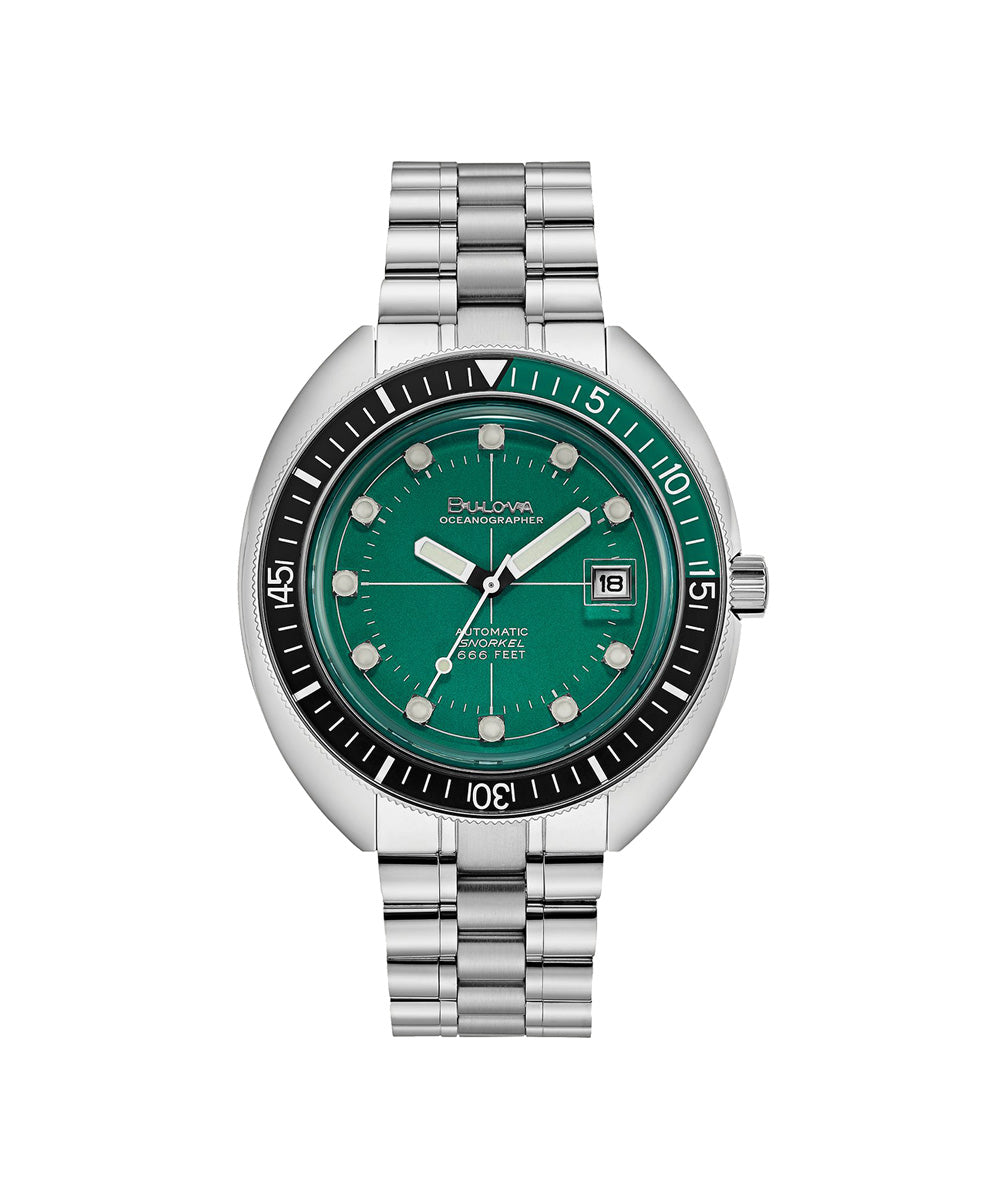 Watch with green dial and silver bracelet on a white background