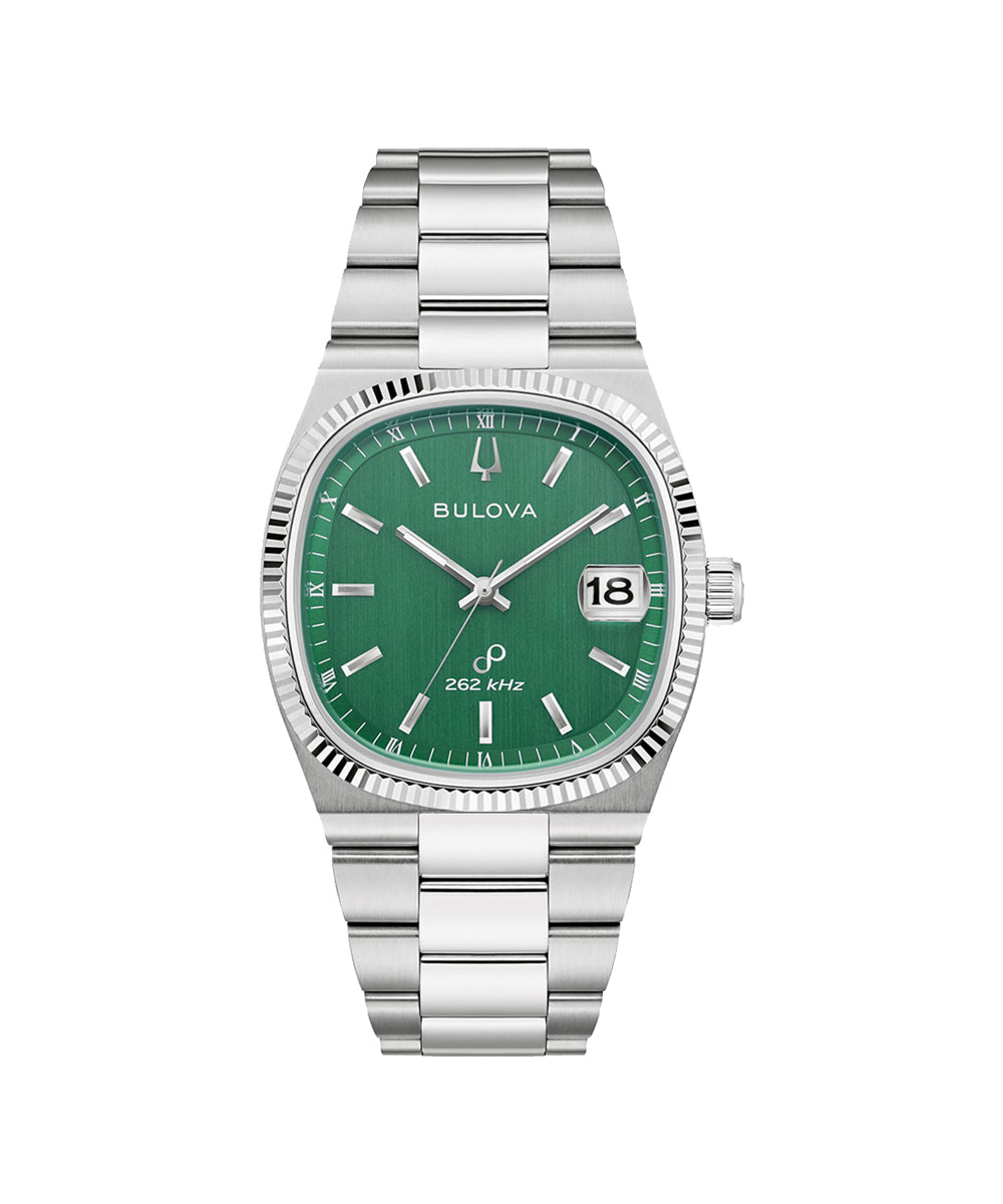 Bulova watch with green face and silver bracelet on white background