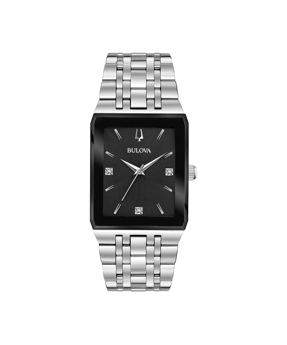 Bulova watch with silver bracelet and black face on a white background