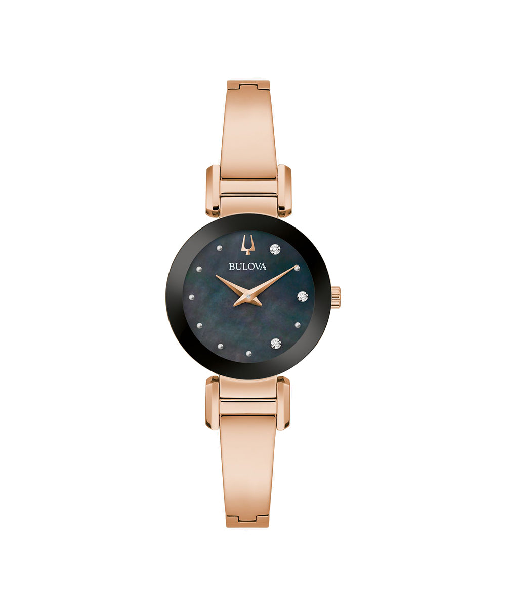 Bulova watch with rose gold band and black dial on a white background