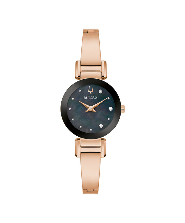 Bulova watch with rose gold band and black dial on a white background