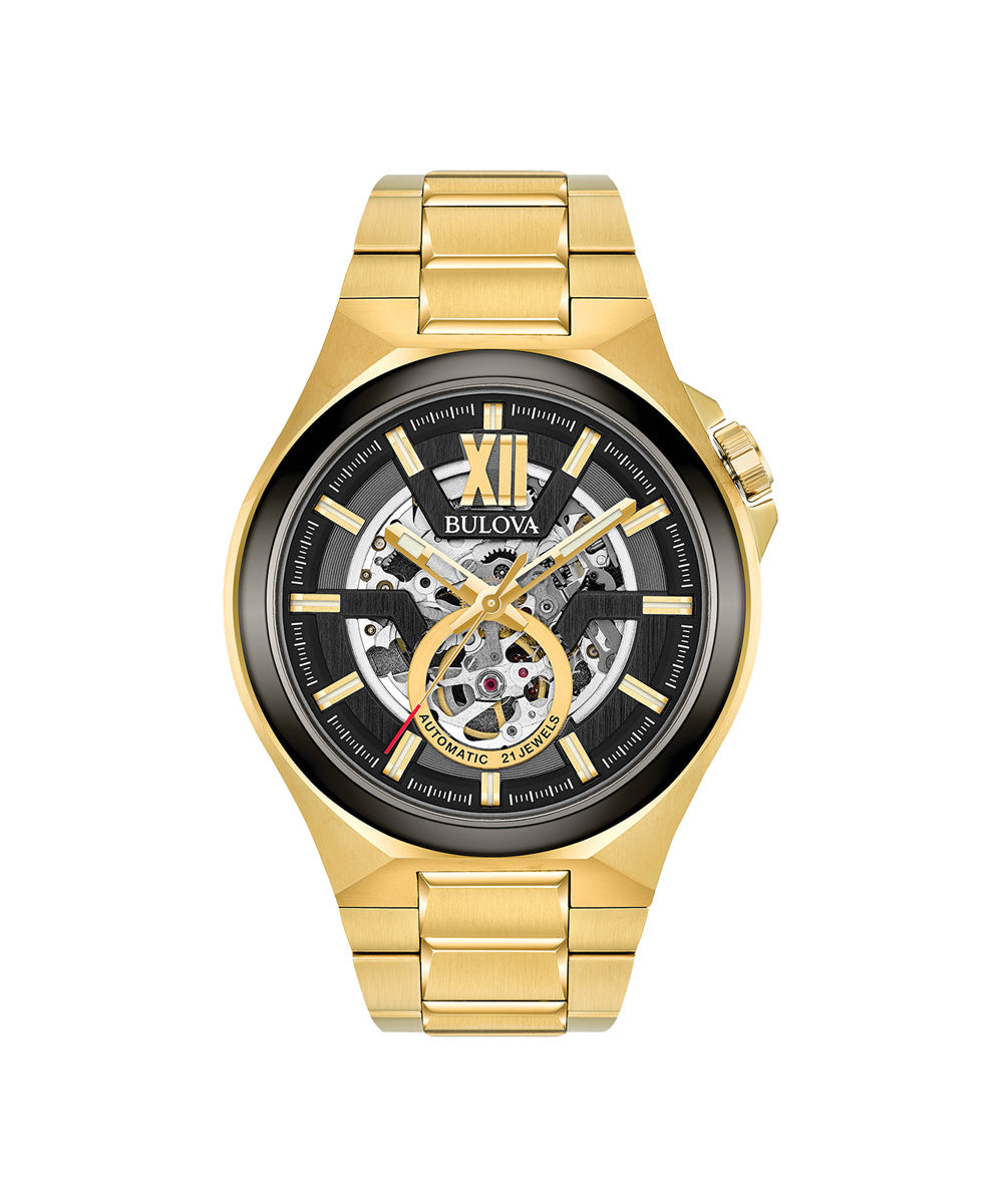 Gold watch with black face on a white background
