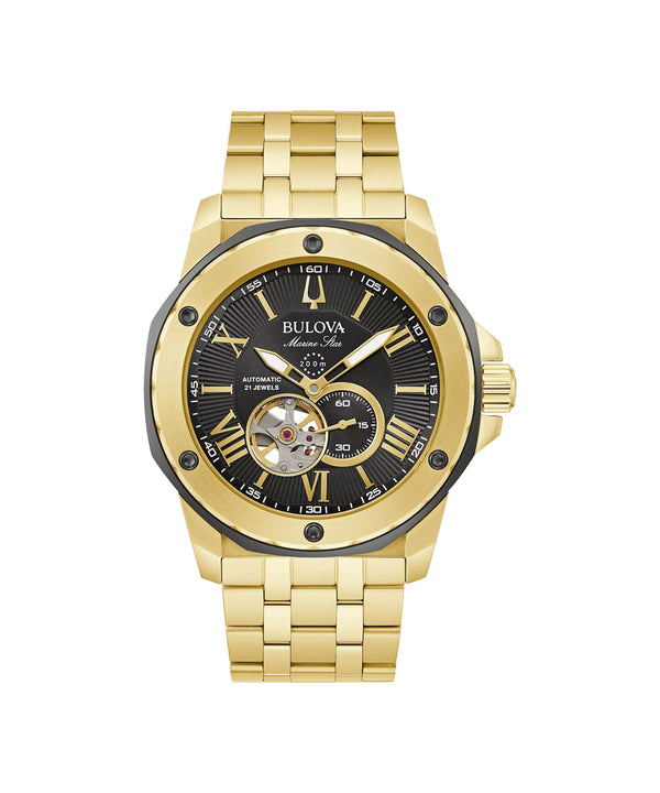 Gold watch with black face on a white background