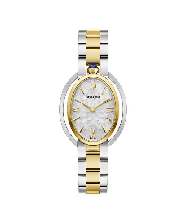 Bulova watch with two-tone gold and silver band on a white background