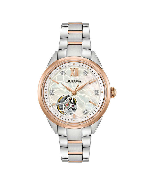 Bulova watch with two-tone rose gold and silver bracelet on a white background