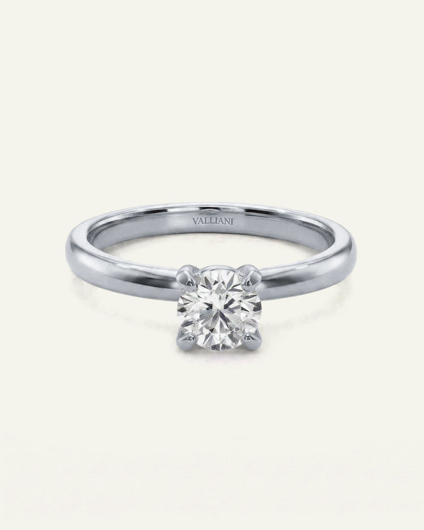 Diamond ring with 'Vallendi' branding on a white background