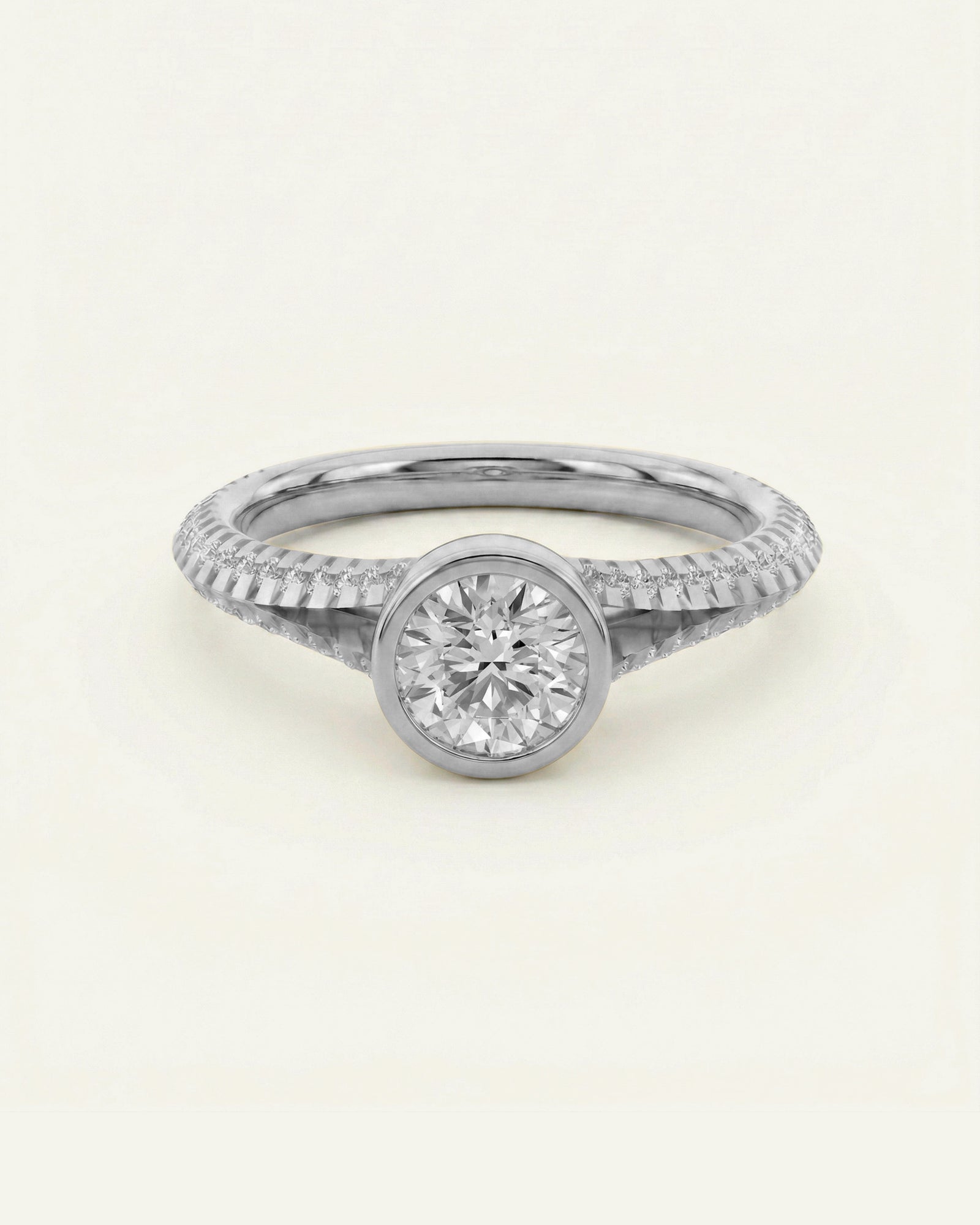 Silver ring with a diamond on a light gray background