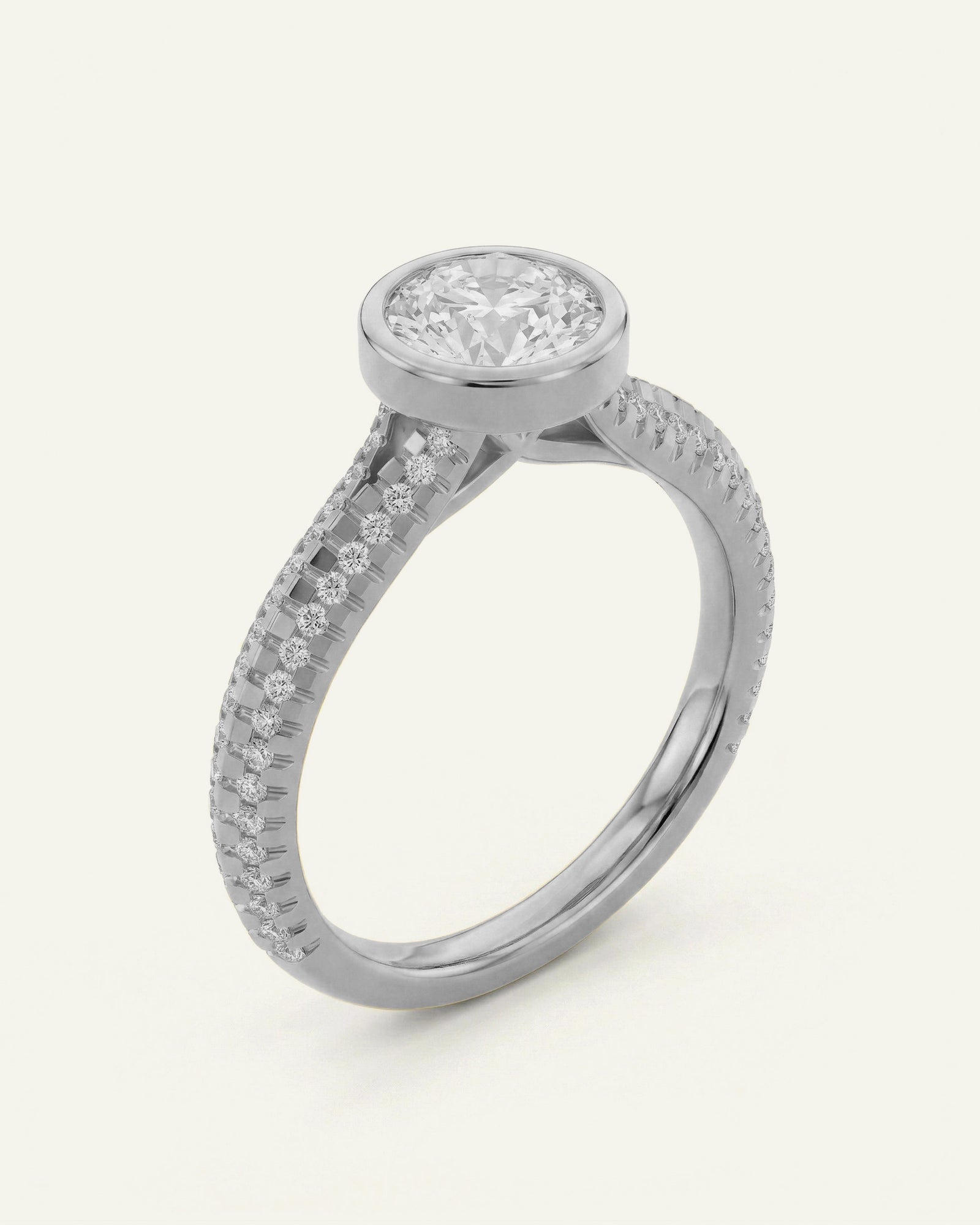 Silver ring with diamond accents on a white background