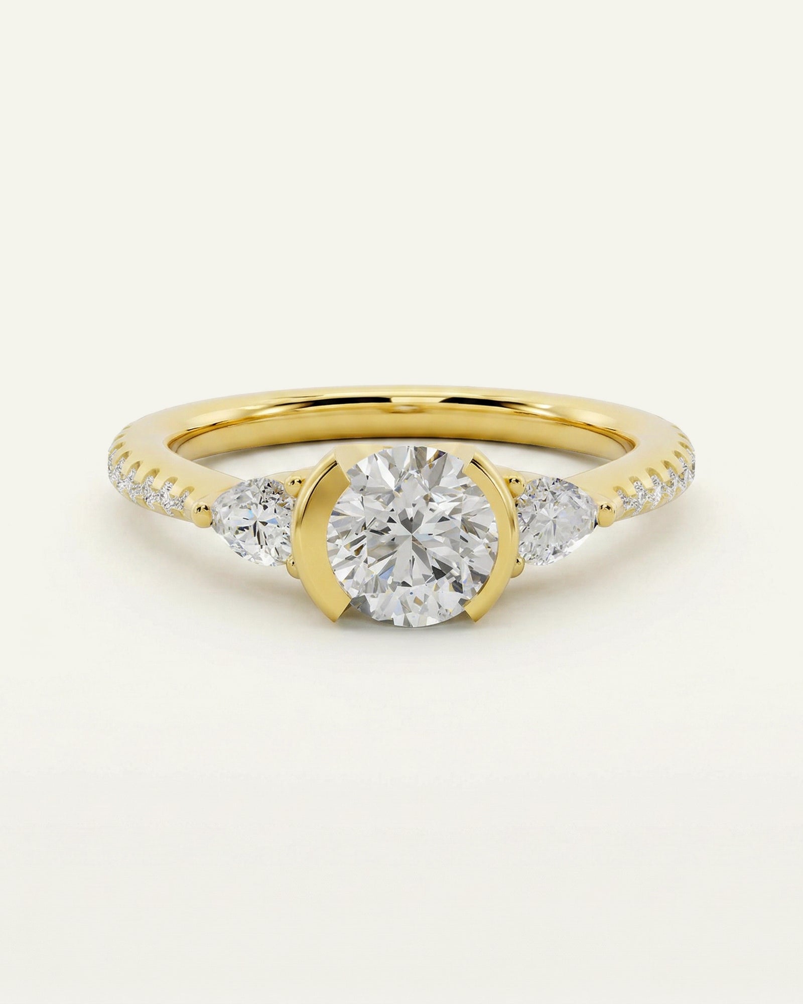 Gold ring with a diamond on a white background