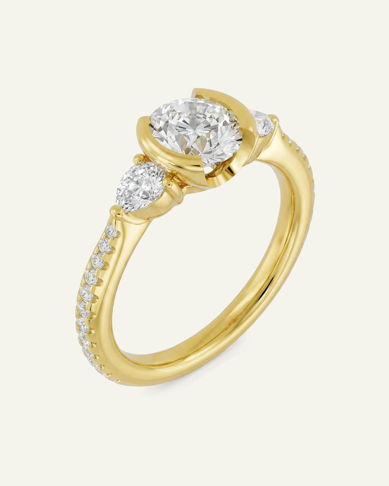 Gold ring with a diamond on a white background