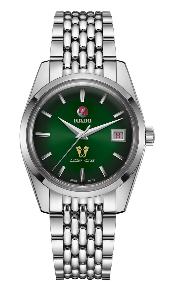 Silver watch with green face on a white background