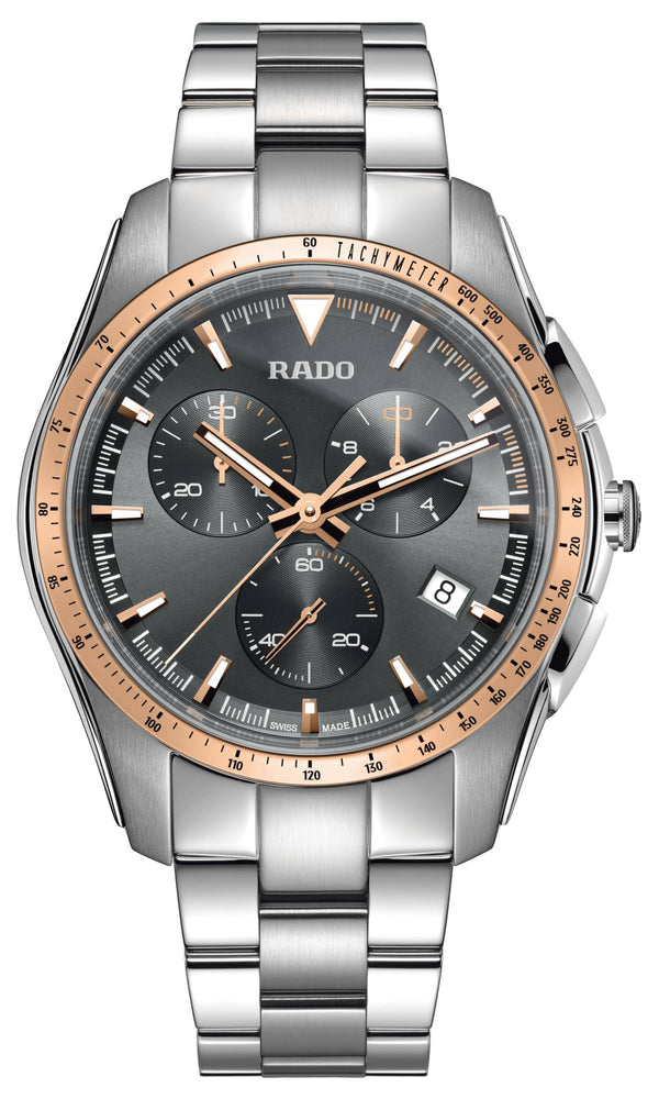 Silver and rose gold Rado watch on a white background