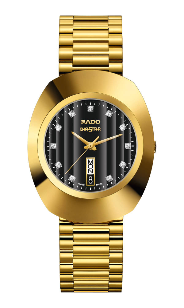 Gold wristwatch with a black dial on a white background