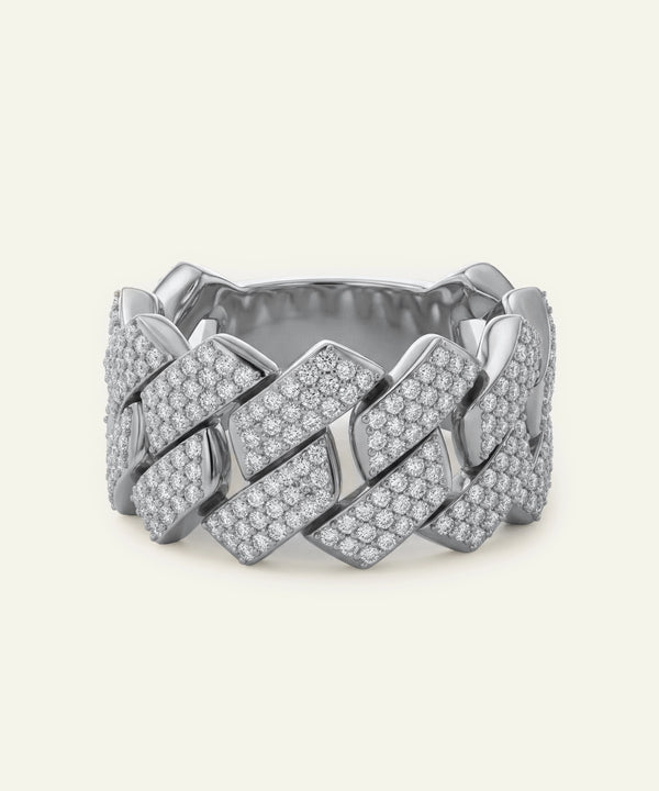 Silver bracelet with diamond accents on a white background