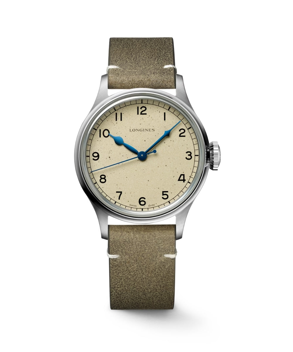 Watch with brown strap and beige dial on a white background