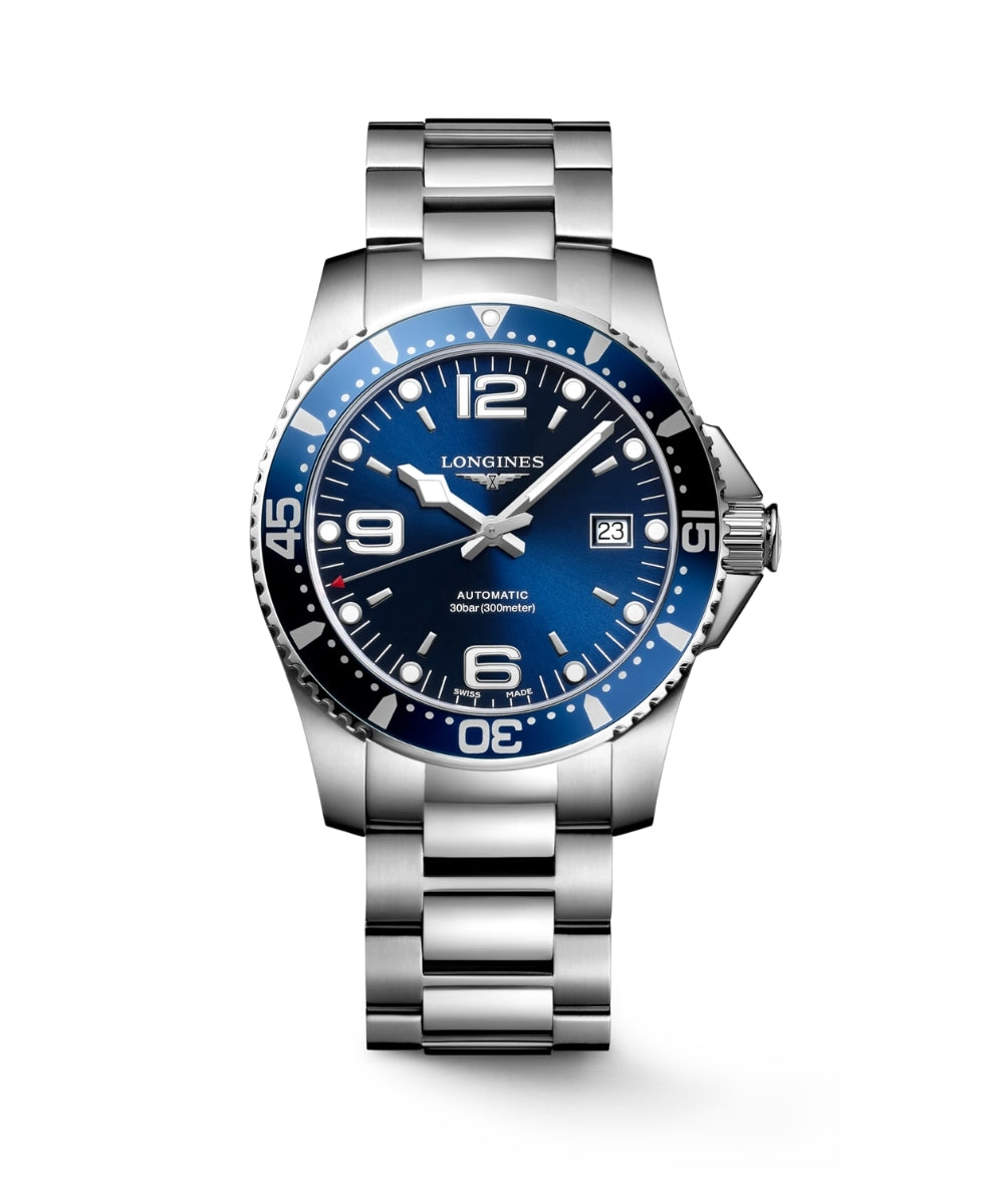 Longines watch with blue dial and silver bracelet on a white background