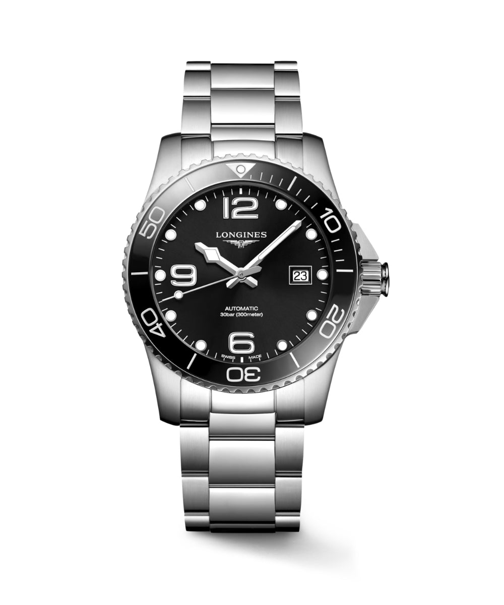 Silver watch with black dial on a white background