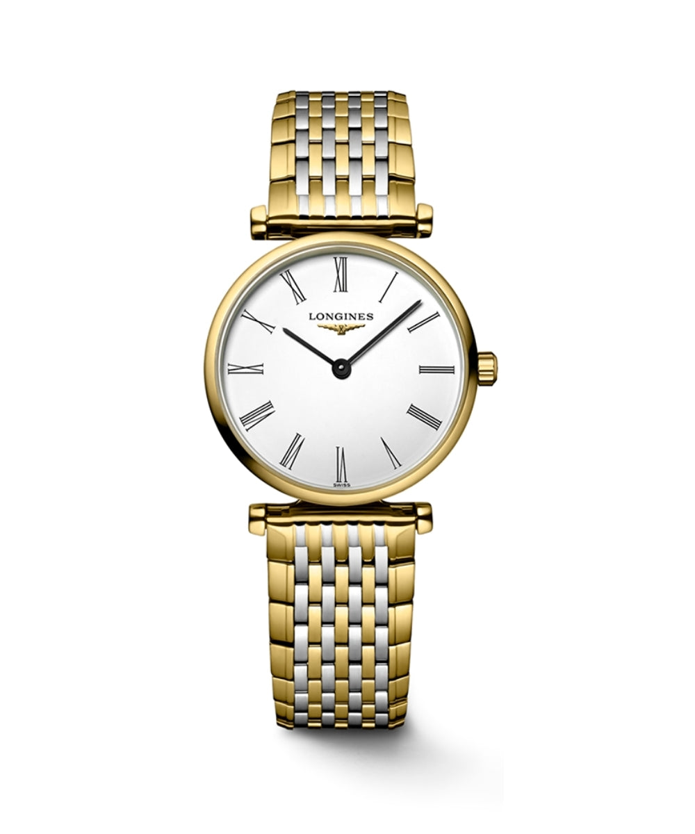 Gold and silver watch with white face on a white background