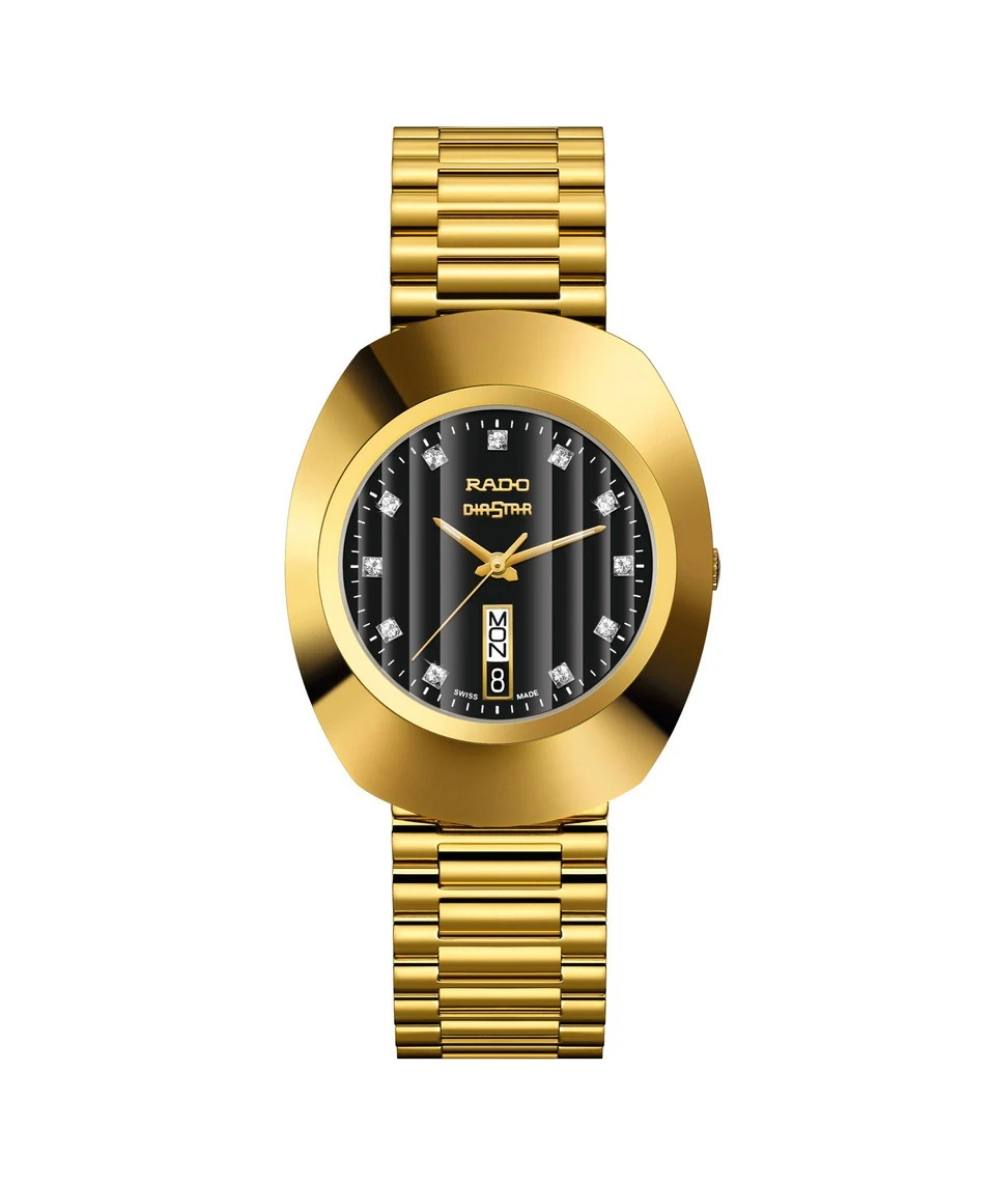 Gold watch with a black face on a white background