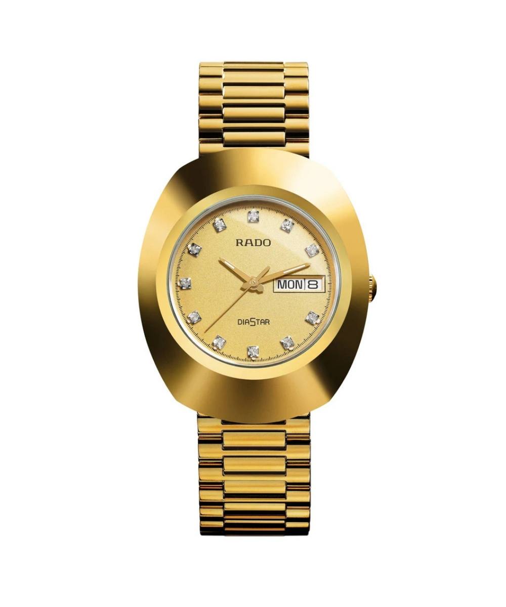 Gold Rado watch with diamond-studded face on a white background